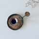 Brass thumbscrew candle holder