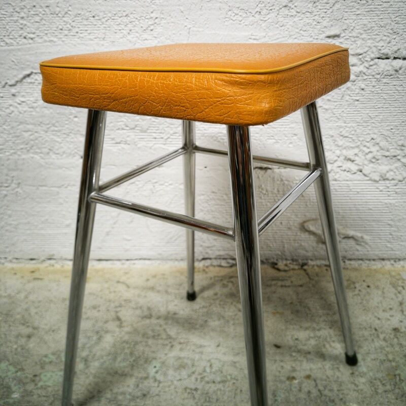 Vintage stool sitting skaï