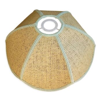 Erect rattan lampshade with pale green edging