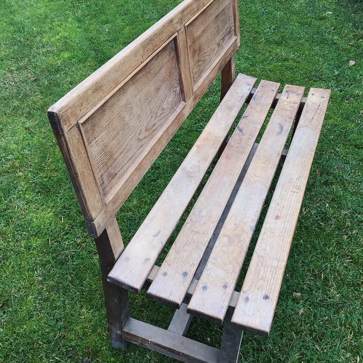 Wooden bench with back