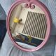 Vintage pink oval cast iron mirror