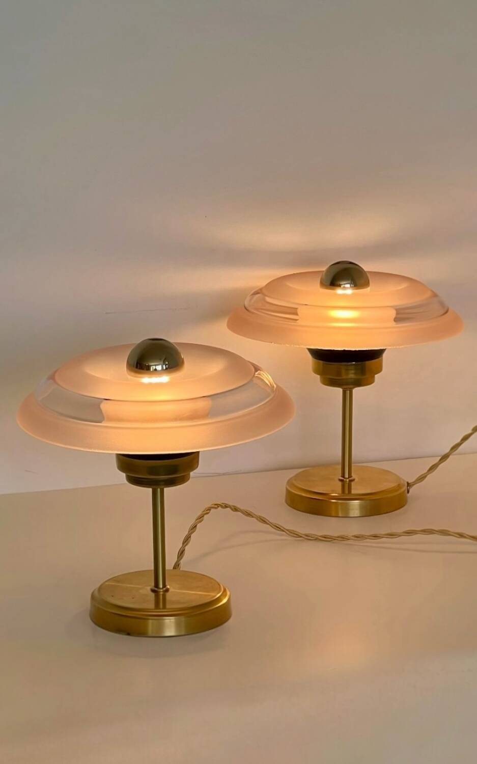 Pair of Art Deco bedside lamps in brass and etched glass