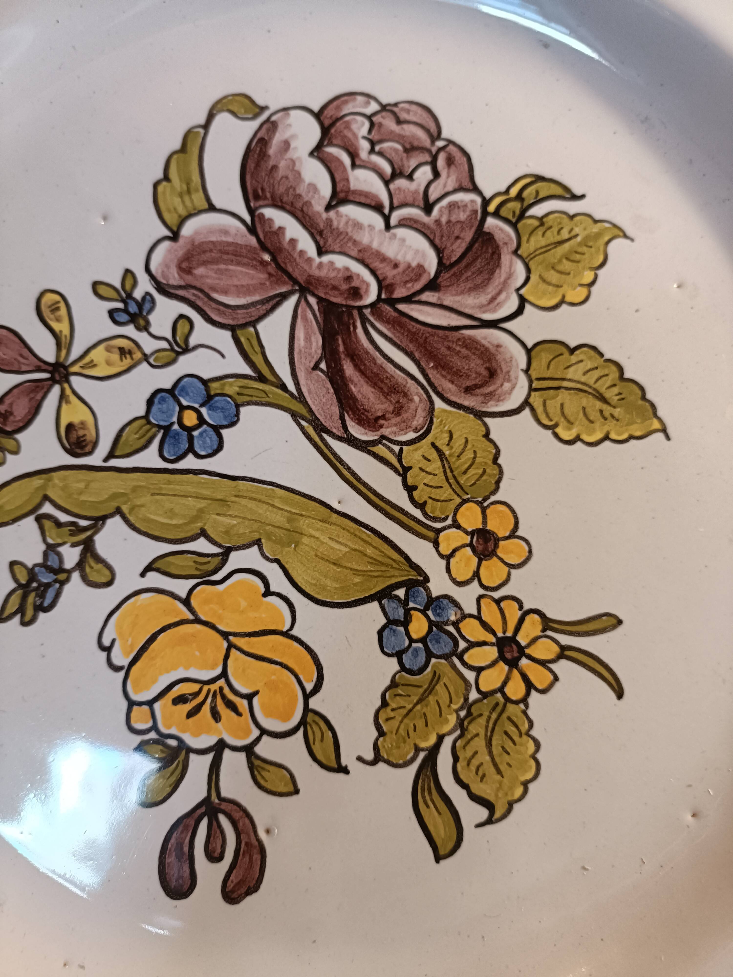 Large antique plate in Meillonnas faience