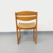 Vintage sleigh chair in beech wood and cane from the 70s and 80s