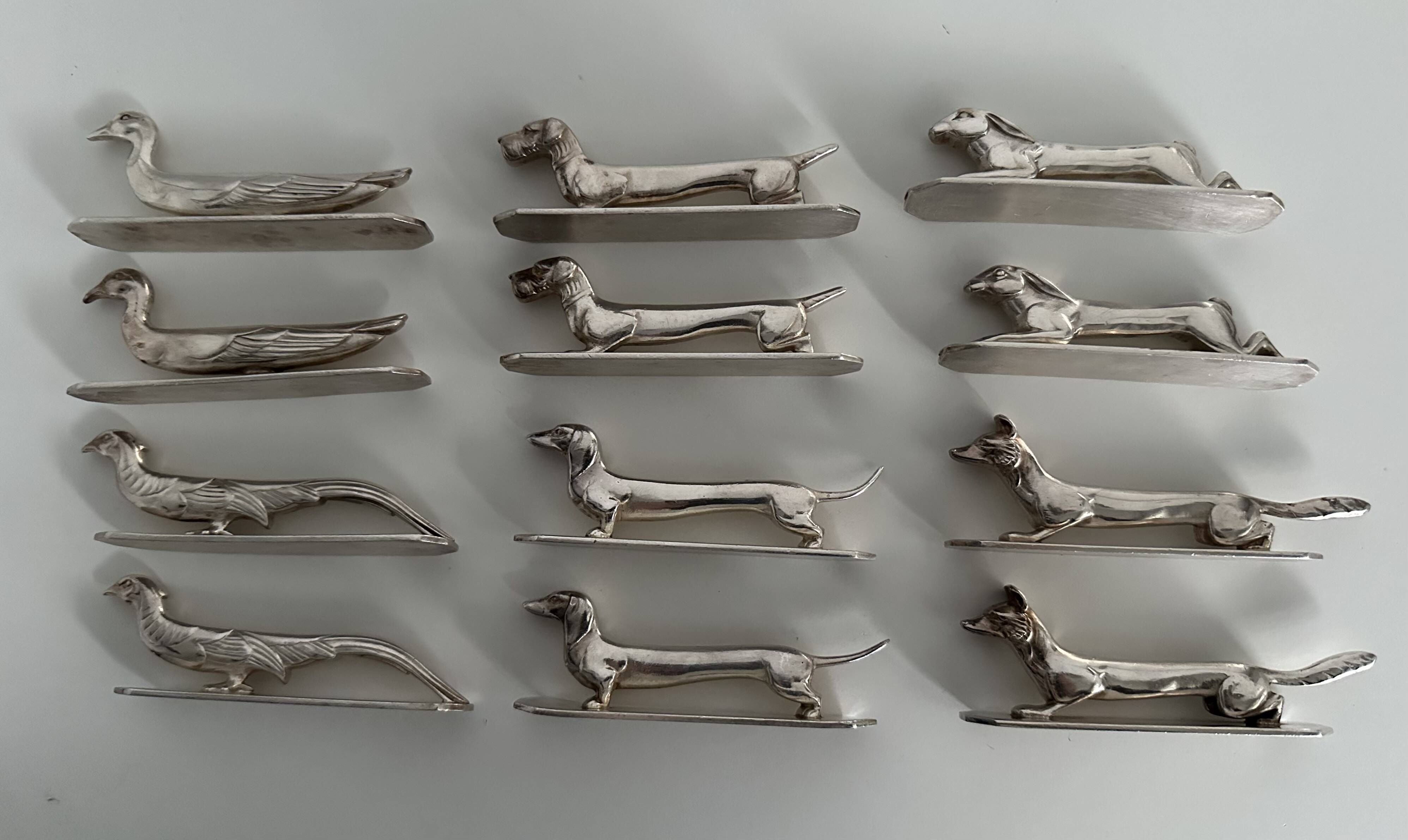12 antique silver-plated bronze knife rests in modern art deco animal designs.
