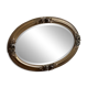 Oval gold mirror