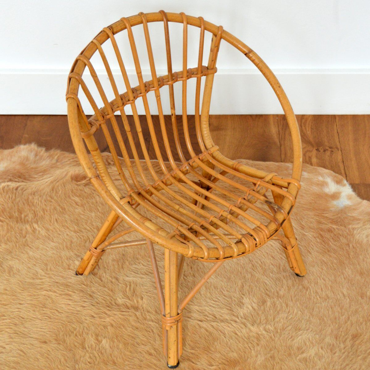 Children's shell armchair in rattan 1960s