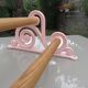 Old towel rack art deco in pink enamelled cast iron