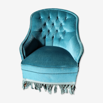 Fauteuil crapaud capitonné velours bleu