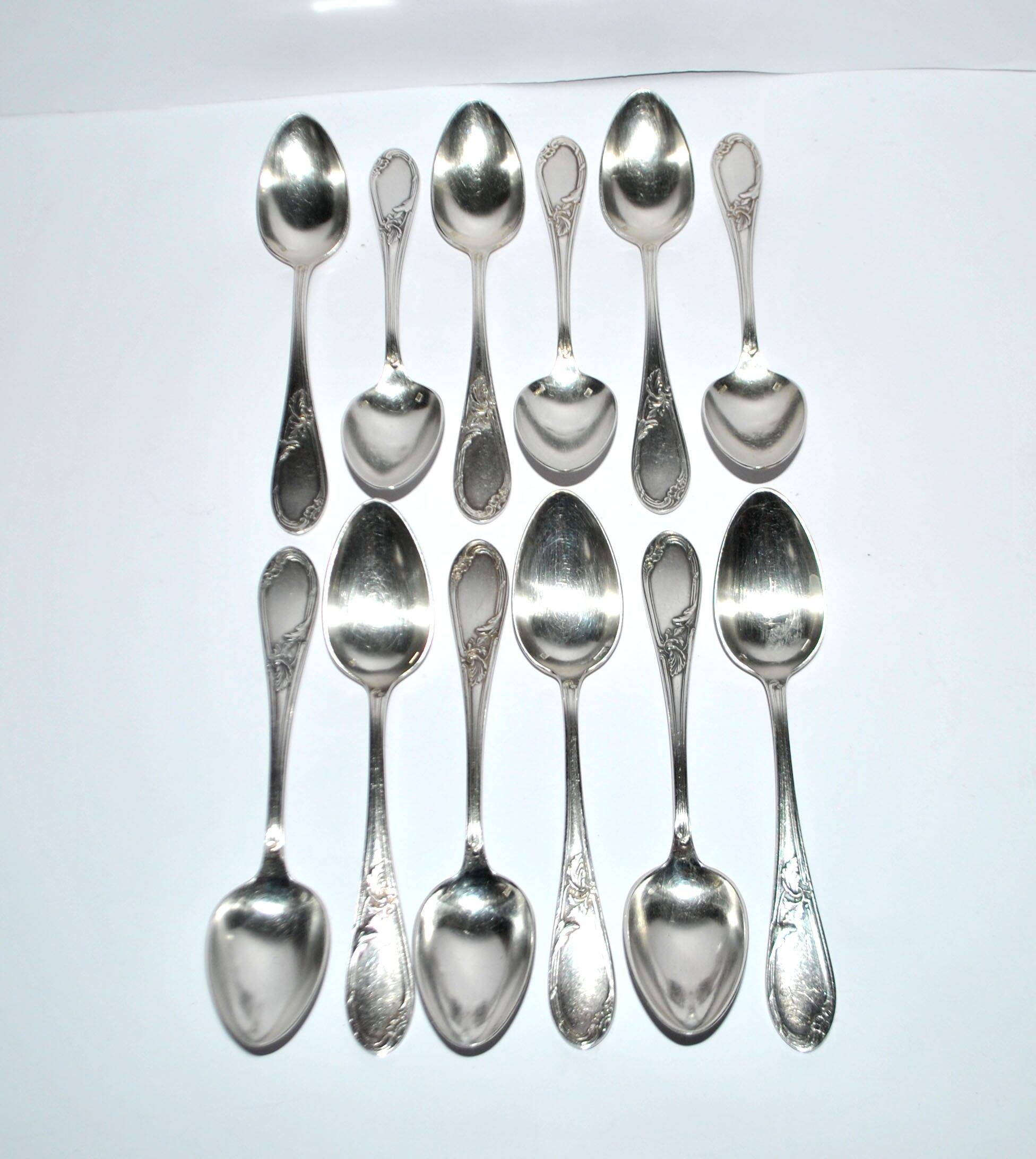 Lot of 12 silver-plated dessert spoons apollo rocaille model.
