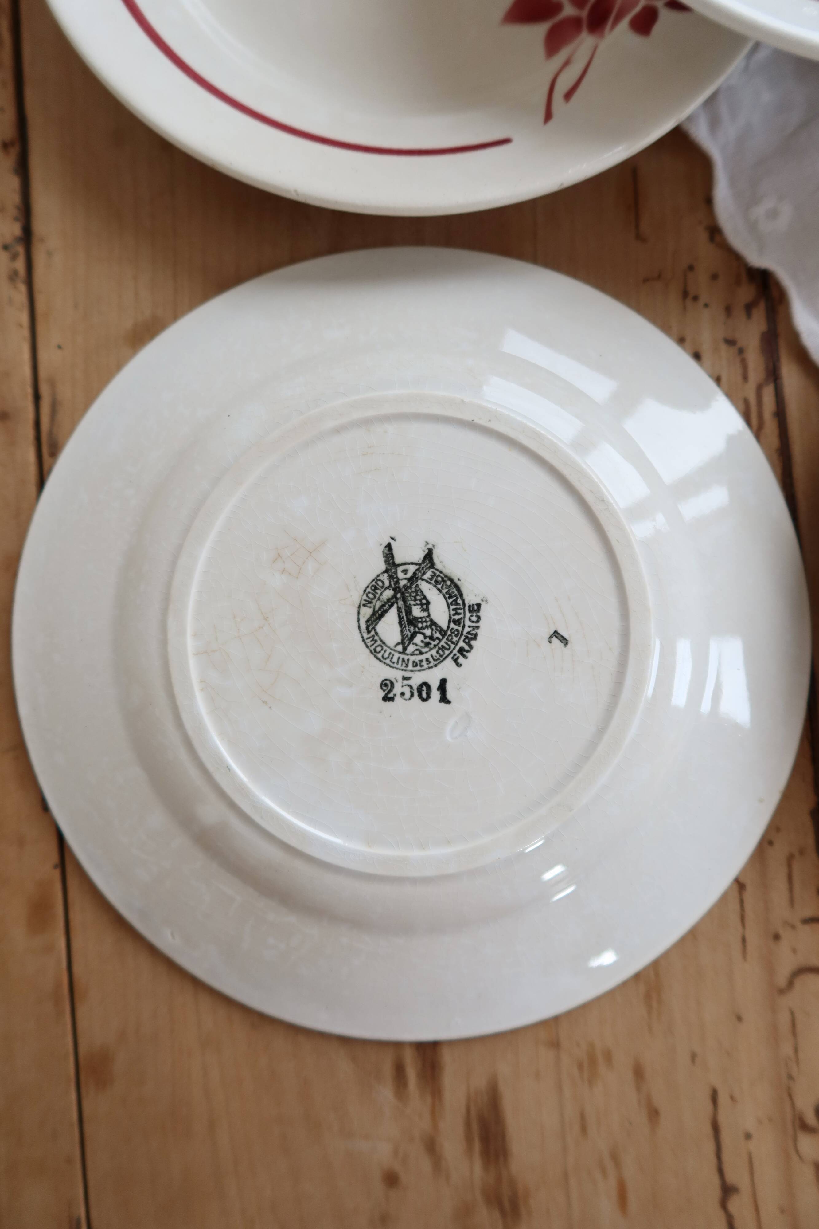 6 vintage dessert plates Moulin des Loups with burgundy floral decoration.