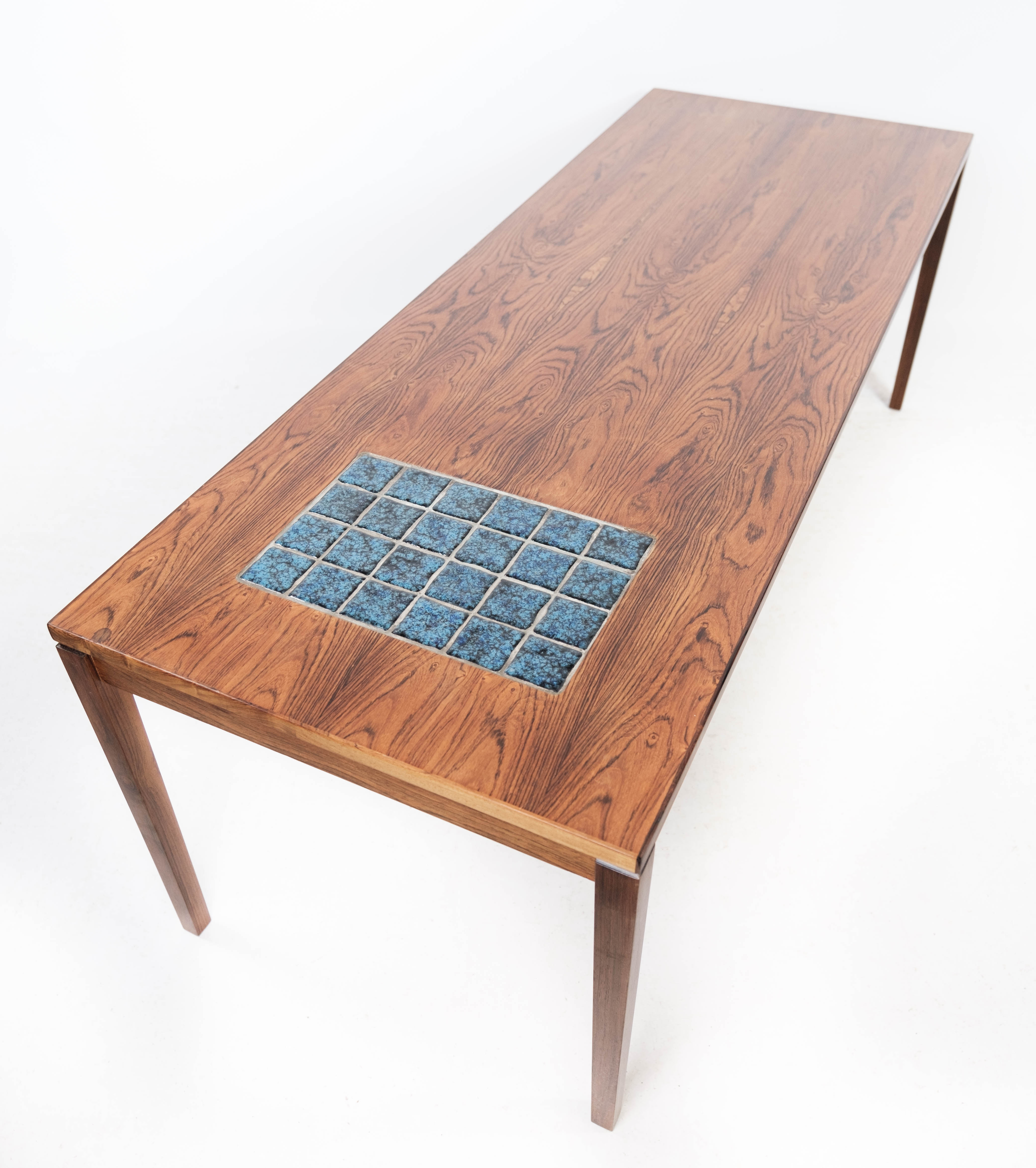 Coffee table in rosewood with blue tiles of Danish design from the 1960s