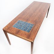 Coffee table in rosewood with blue tiles of Danish design from the 1960s