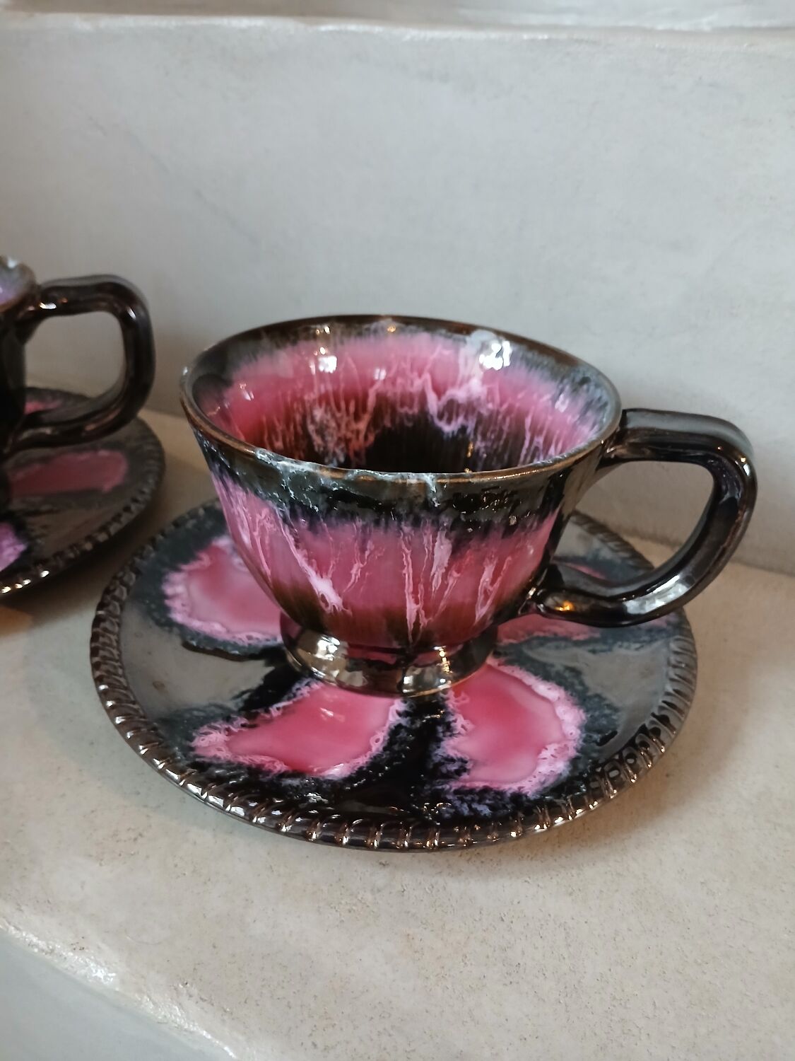 2 vintage cups and saucers