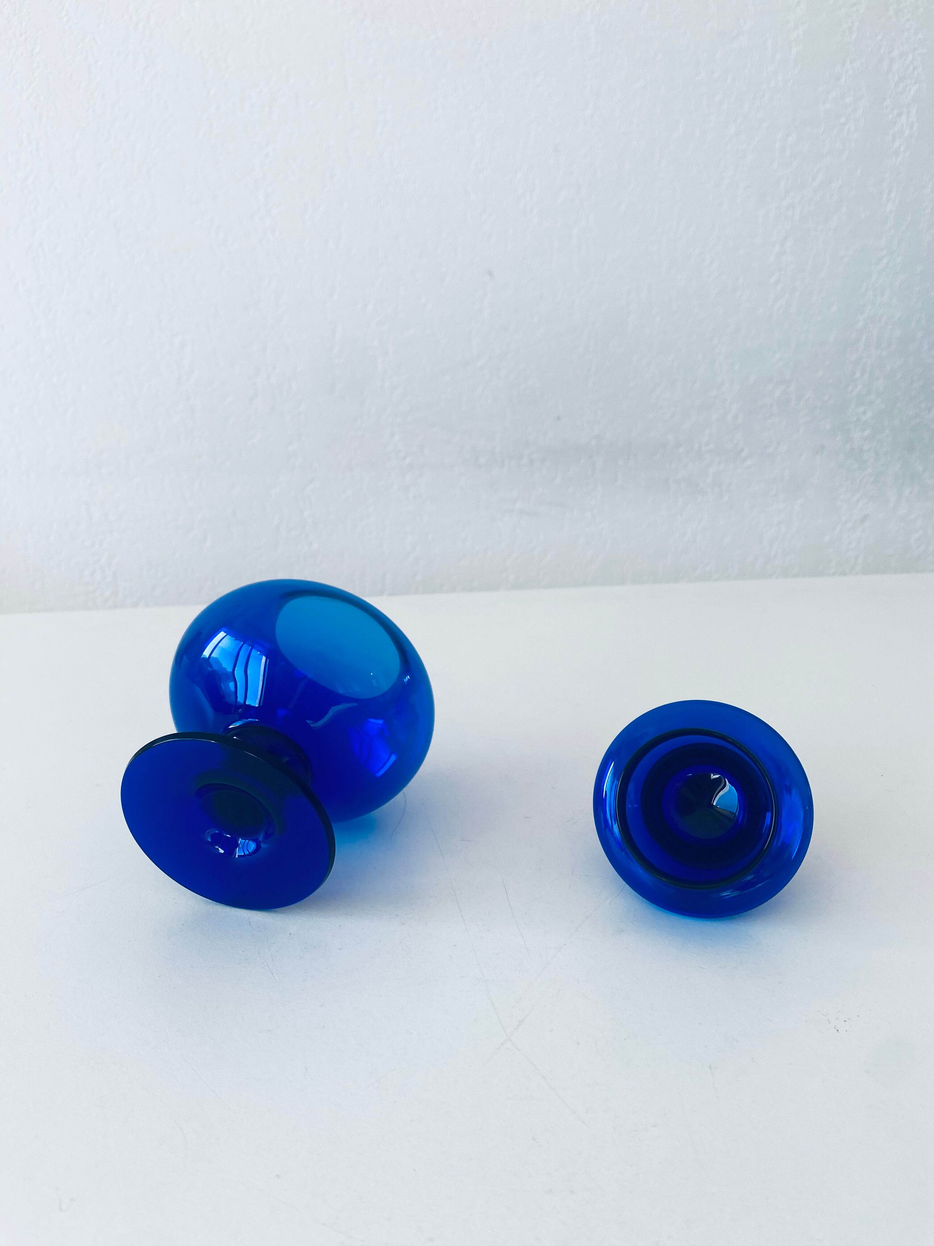 Blue glass apothecary shaped bottle