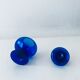 Blue glass apothecary shaped bottle