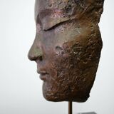 Buddha head sculpture, marble base