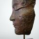 Buddha head sculpture, marble base