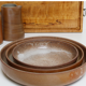Set of trundle sandstone dishes