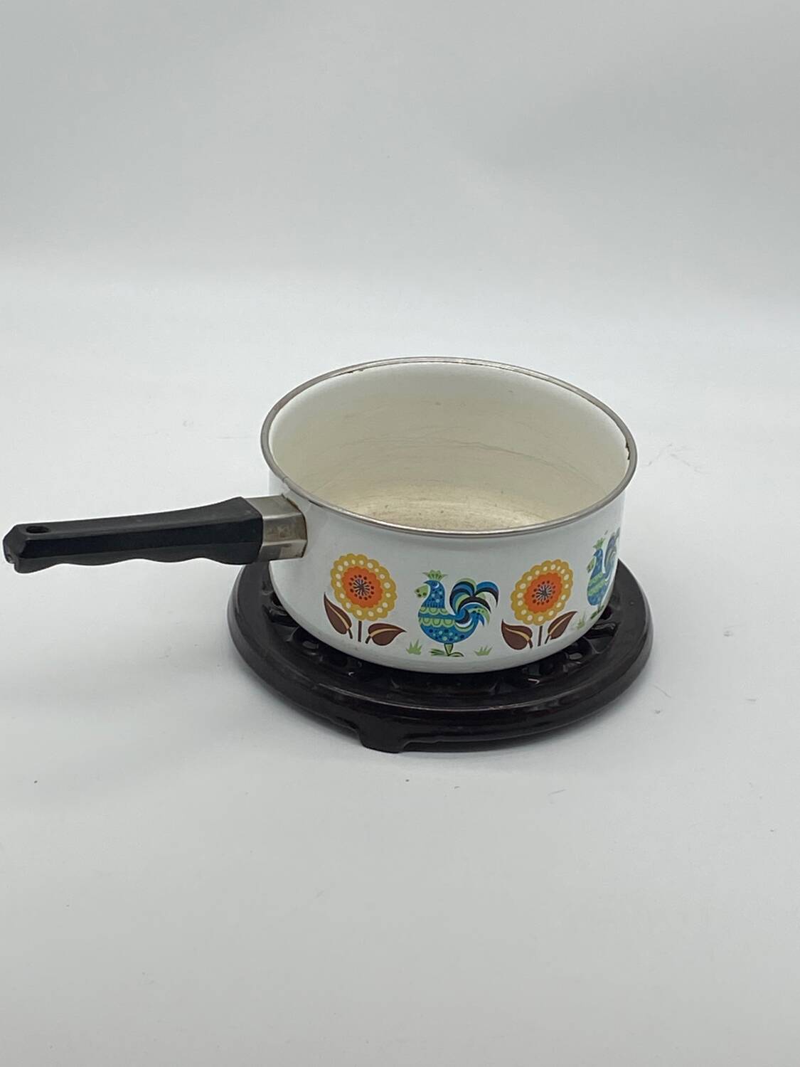 Brown enameled cast iron trivet vintage, old