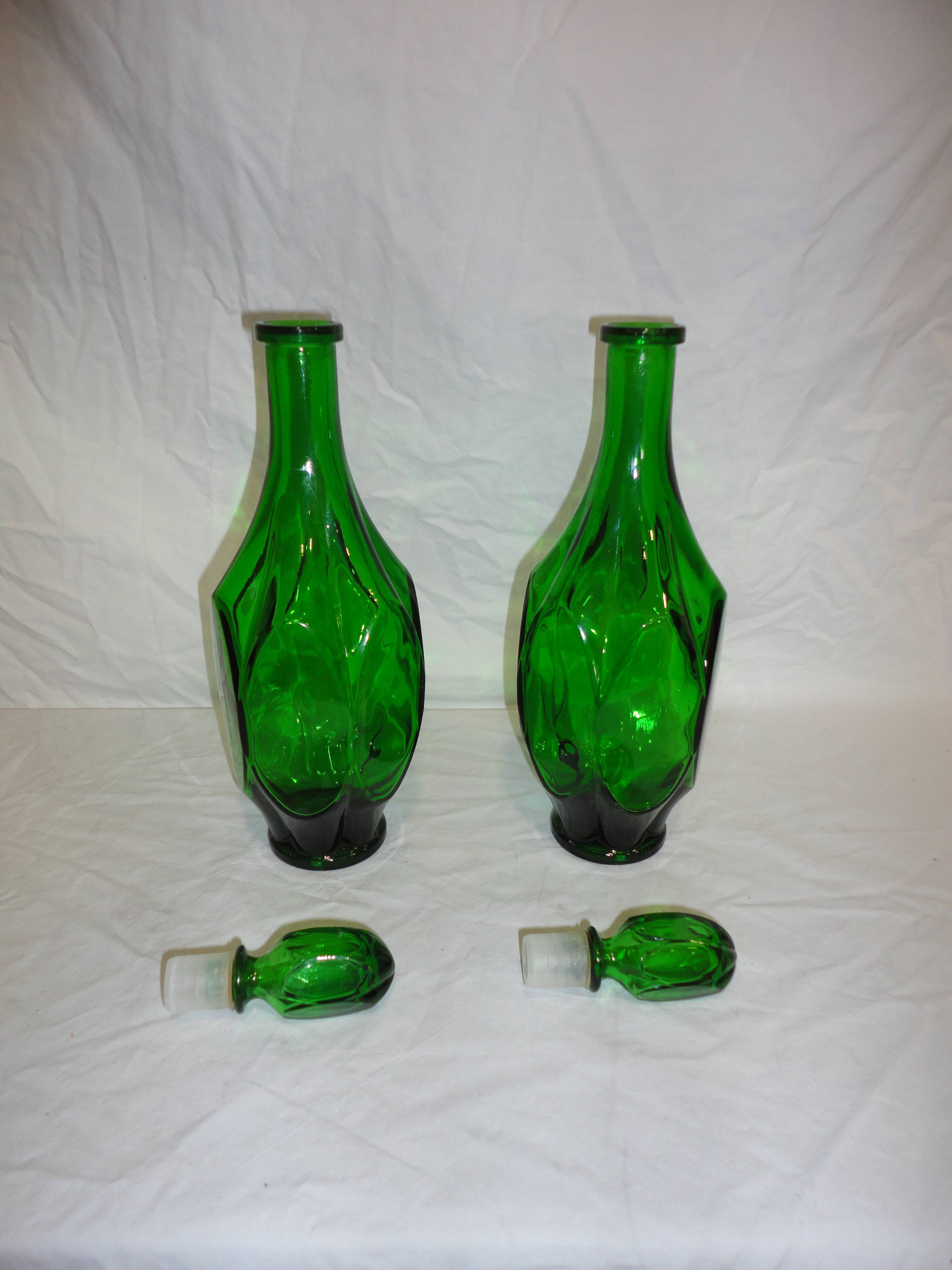 Set of 2 vintage carafes faceted in green glass with caps