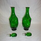 Set of 2 vintage carafes faceted in green glass with caps
