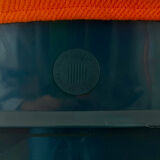 Chrome metal chair with orange fabric from the 70s.