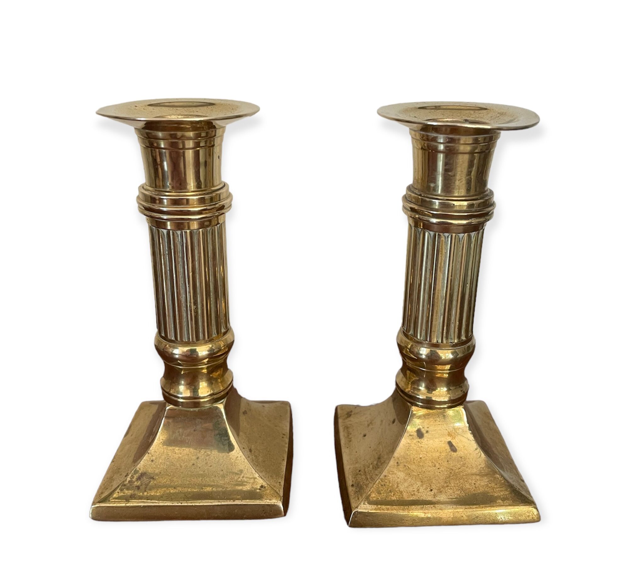 Pair of brass column candle holders
