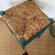 Vintage stool in green patinated wood and straw