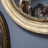 Miroir ovale en bois doré 93x73cm