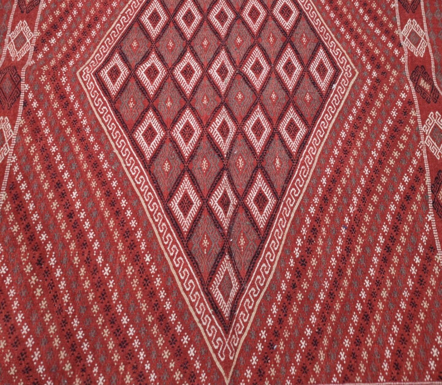 Hand-woven red margoum carpet