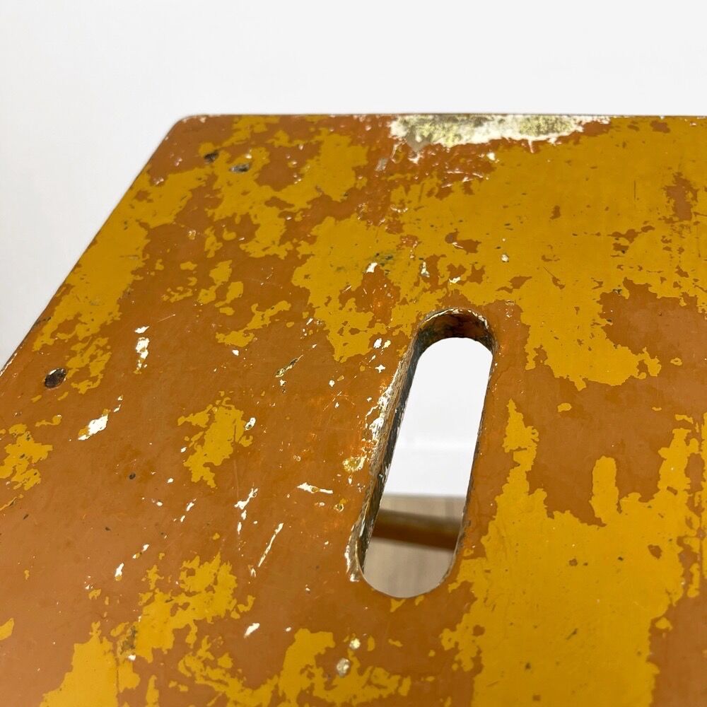 Old slotted milking stool