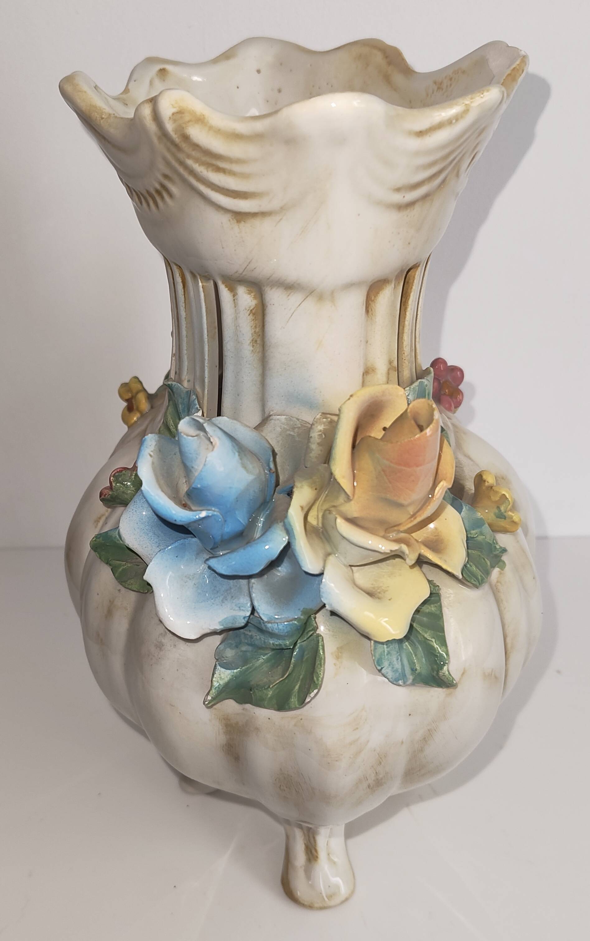 Antique ceramic pot-pourri vase with relief floral decoration.