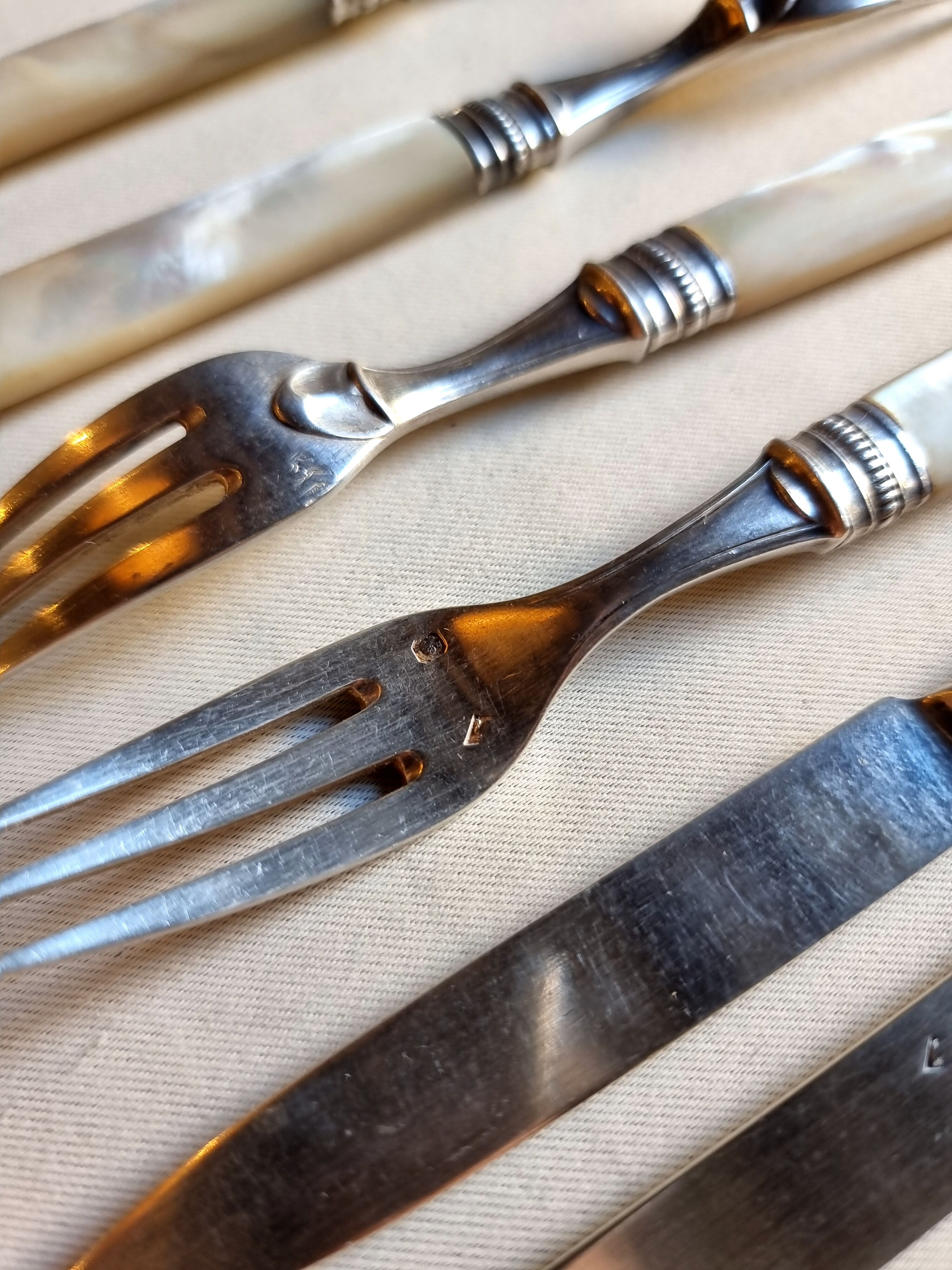Knives and forks, XIXth, silver blades and forks, mother-of-pearl handle, minerva hallmark