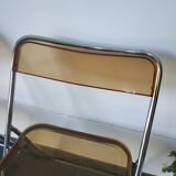 Seventies stainless steel and caramel chairs