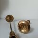 Set of two straight brass candlesticks.