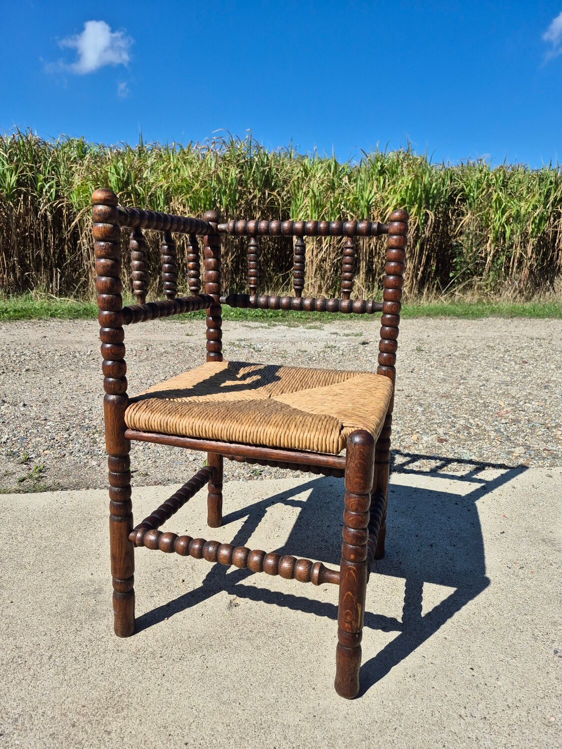 Vintage Dutch rustic corner chair bobbin turned oak with rush seating