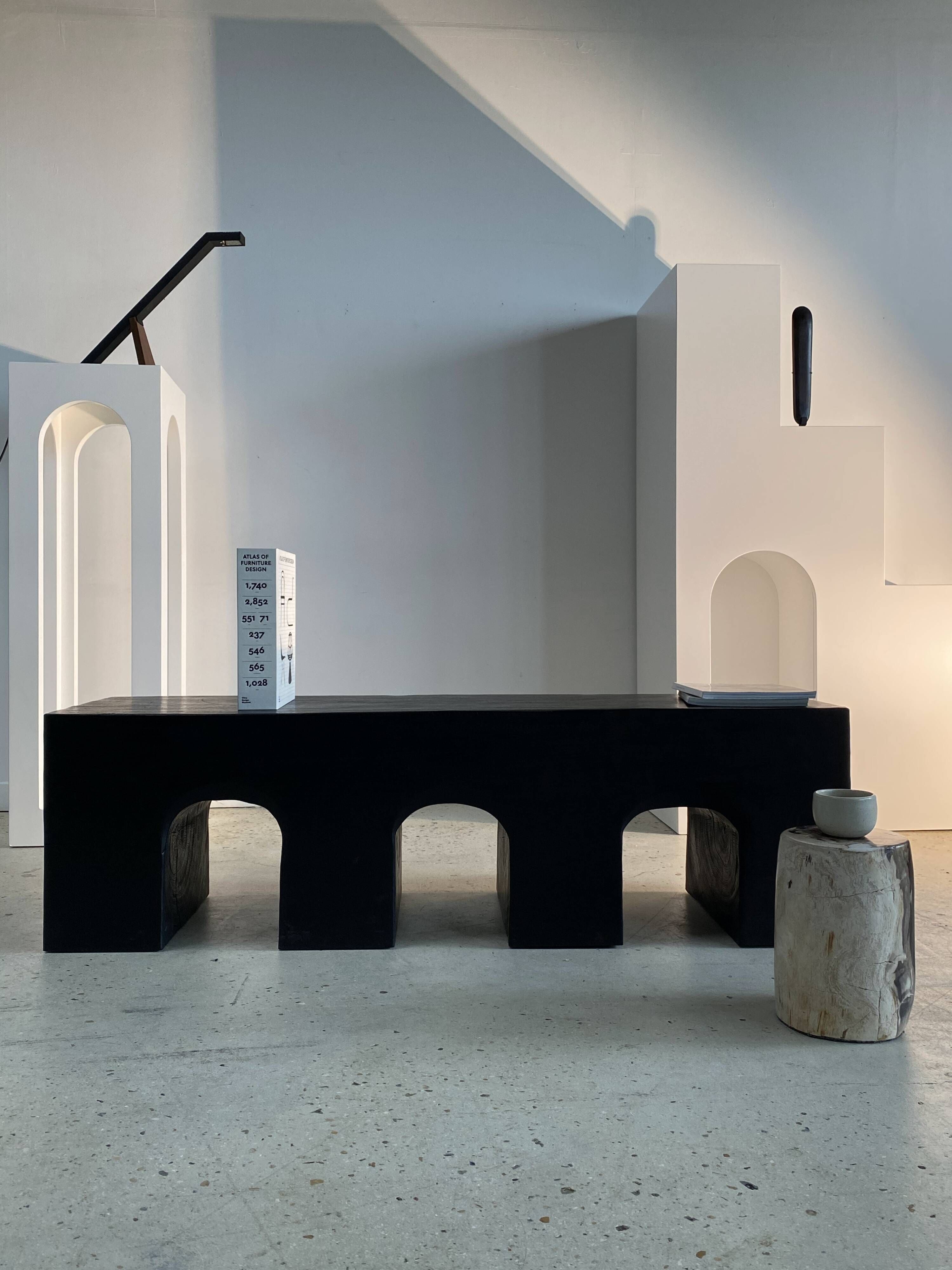 Bench in solid monoxyl wood, carved base in 3 arches - Black color