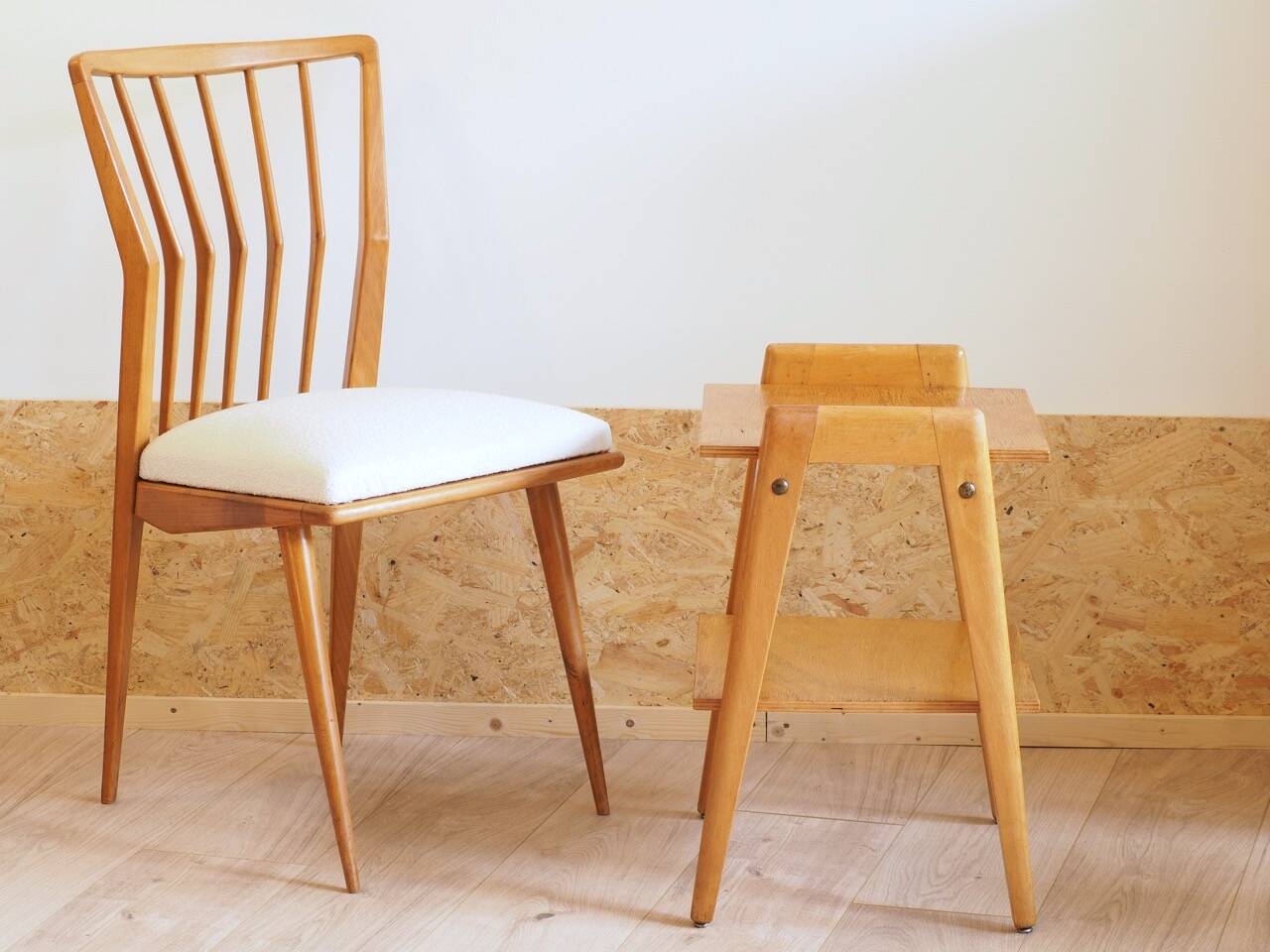 Bedside or side table with compass legs.