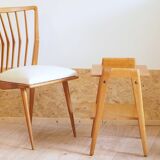 Bedside or side table with compass legs.