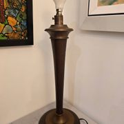 Vintage lamp base in Scandinavian style made of dark wood and bronze metal.