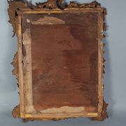 Mirror circa 1800, carved and gilded wooden frame, rocaille decoration, 54x39 cm, C227