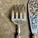 2 silver openwork service cutlery sets engraved with "AS"