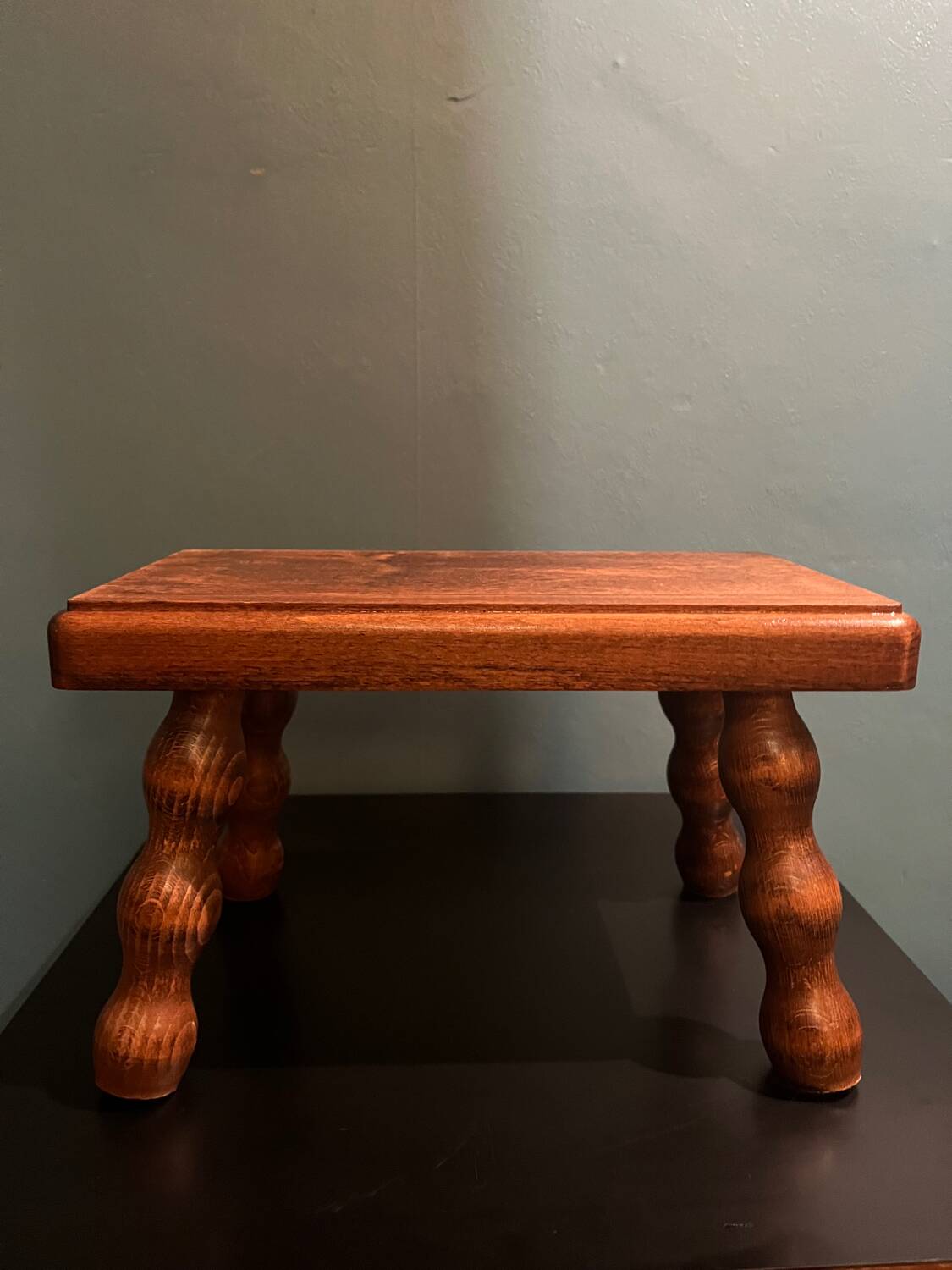 Small wooden stool or footrest
