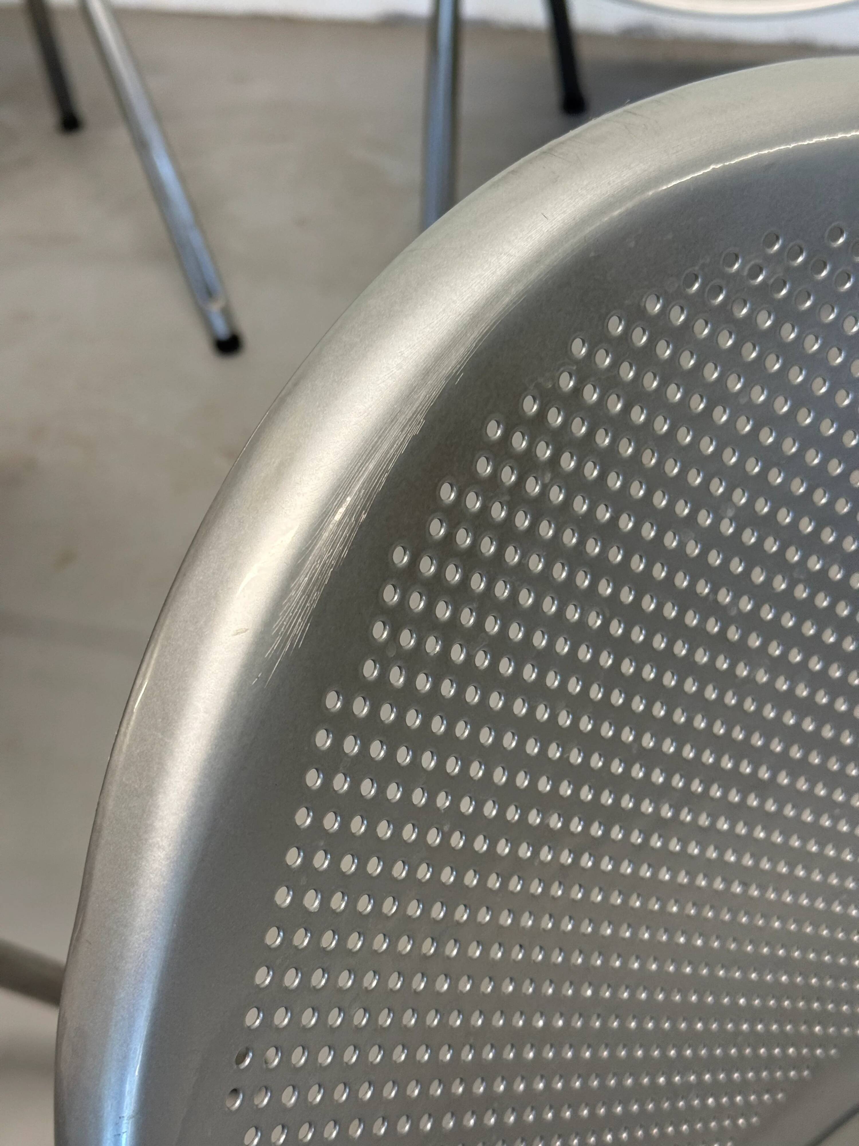 Vintage Sokoa stackable chairs, brutalist perforated metal chairs.
