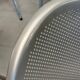 Vintage Sokoa stackable chairs, brutalist perforated metal chairs.