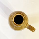 Enameled ceramic bottle with handle