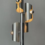 Lampe design en métal avec quatre ampoules argentées