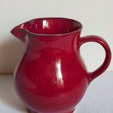 Vintage red enamel ceramic pitcher