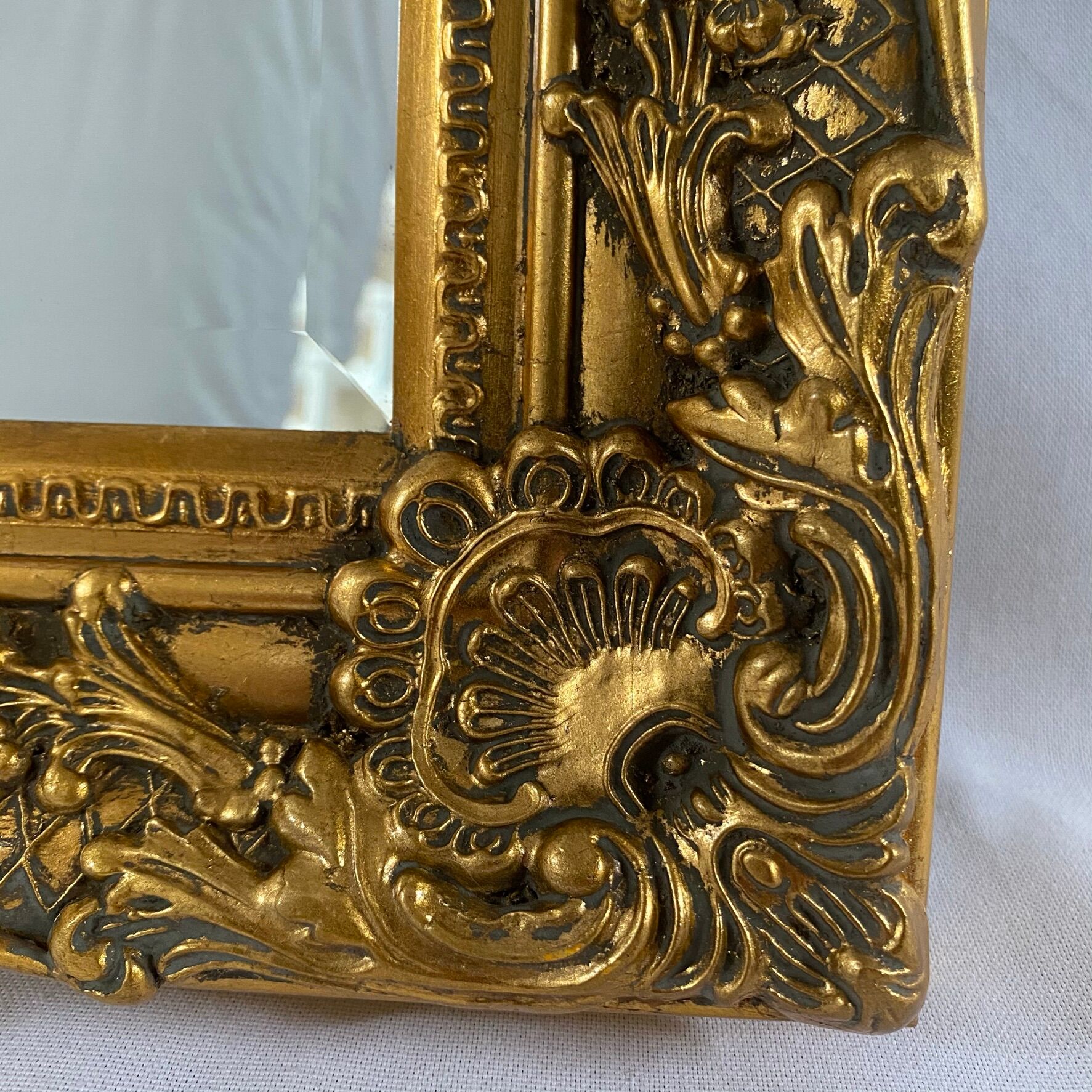 Bevelled mirror, golden empire style 74x64cm